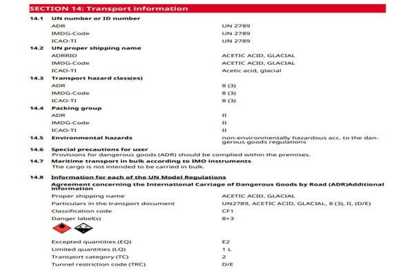 A person reviewing a Safety Data Sheet (SDS) document