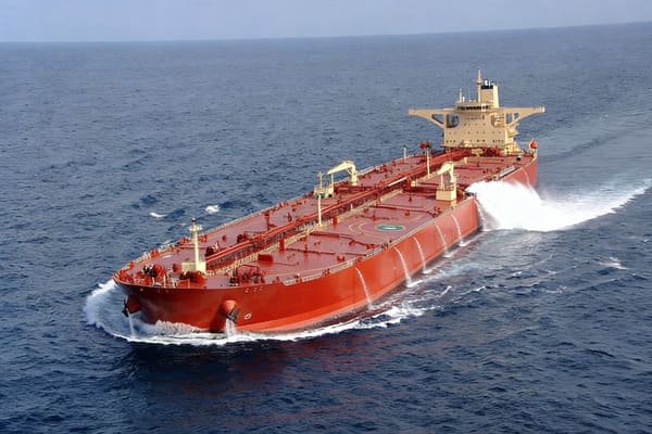 An aerial view of the Strait of Hormuz with many ships