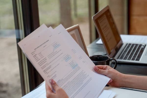 Stack of shipping documents on a desk