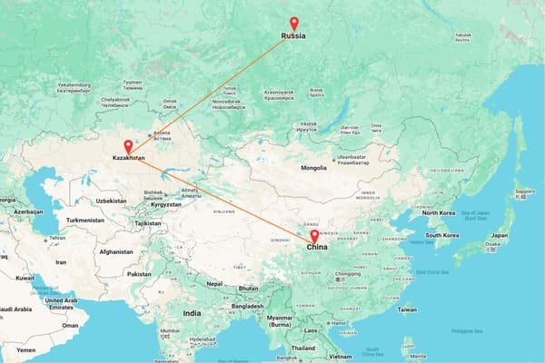 Map showing trade routes from China through Central Asia to Russia, with arrows indicating cargo flow.